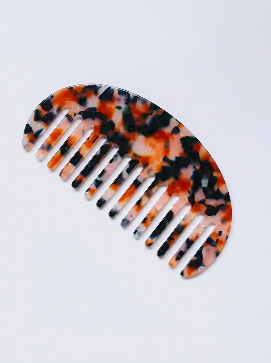 Half moon acetate hair comb on surface - view 7