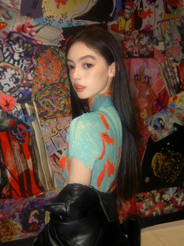 All-over koi print mock neck mesh top on model