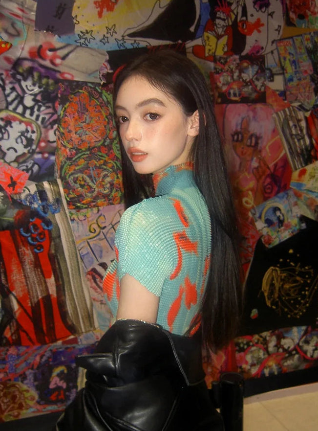 All-over koi print mock neck mesh top on model