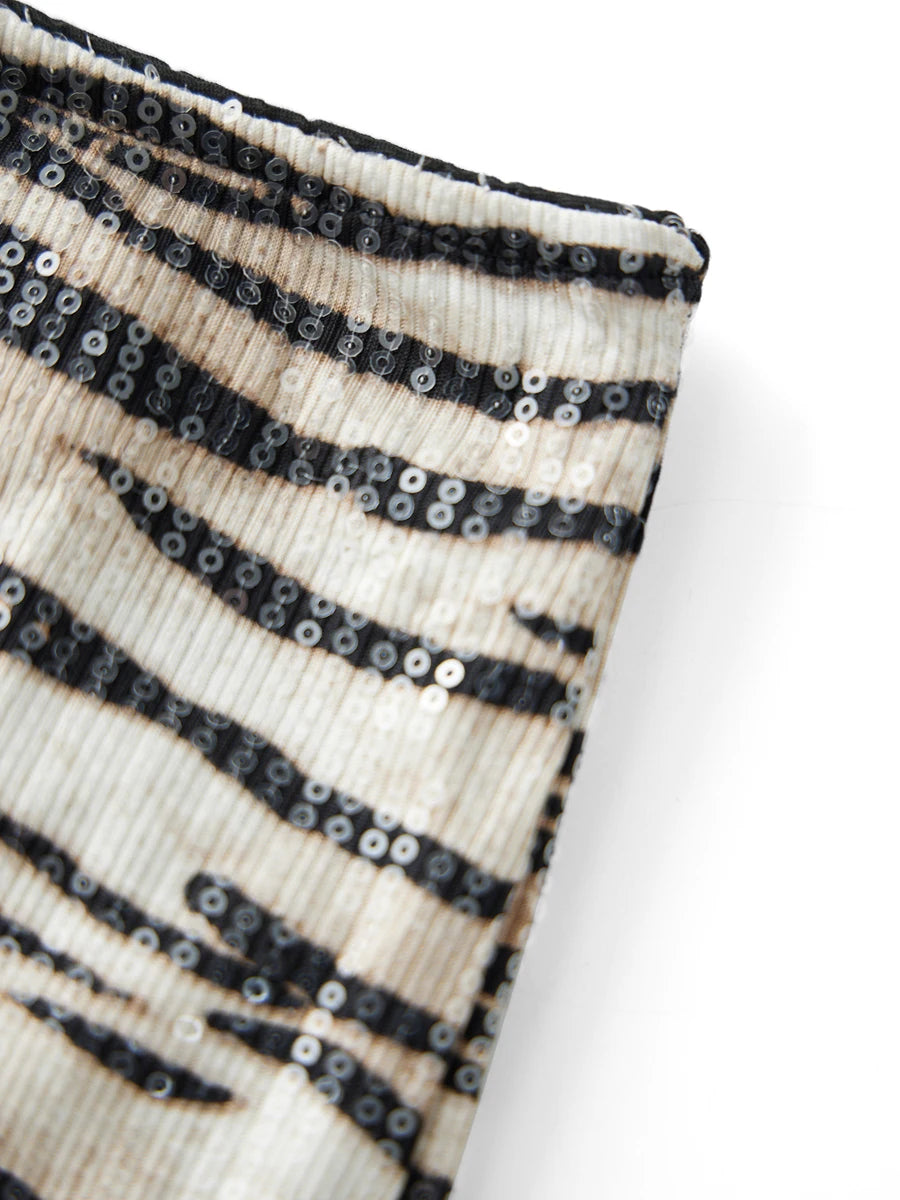 Sequin zebra print micro shorts on model - detail shot