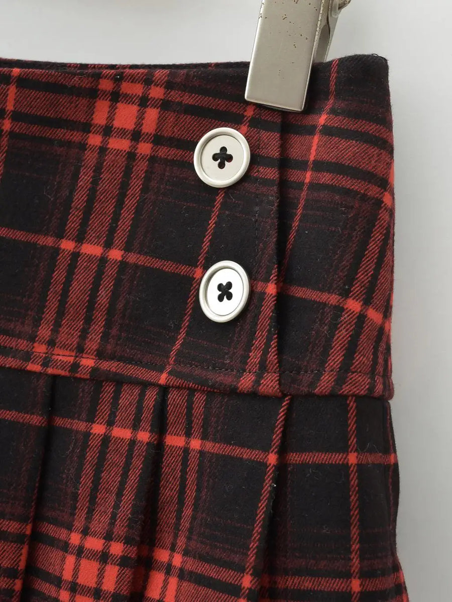 Plaid mini skort on model - detail shot
