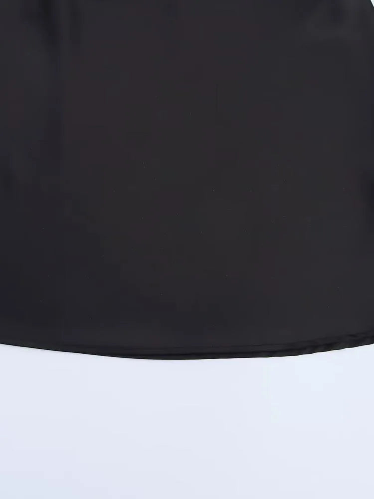 Satin halter mini dress on model - styling view
