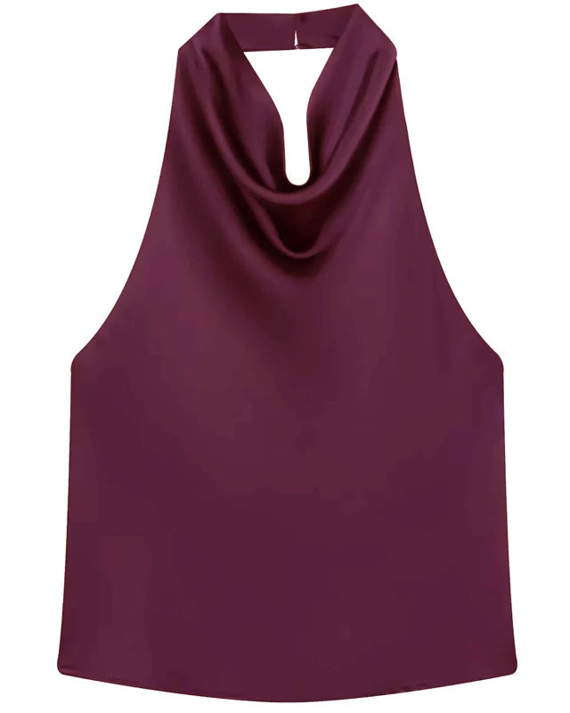 Satin backless halter top on model - styling view