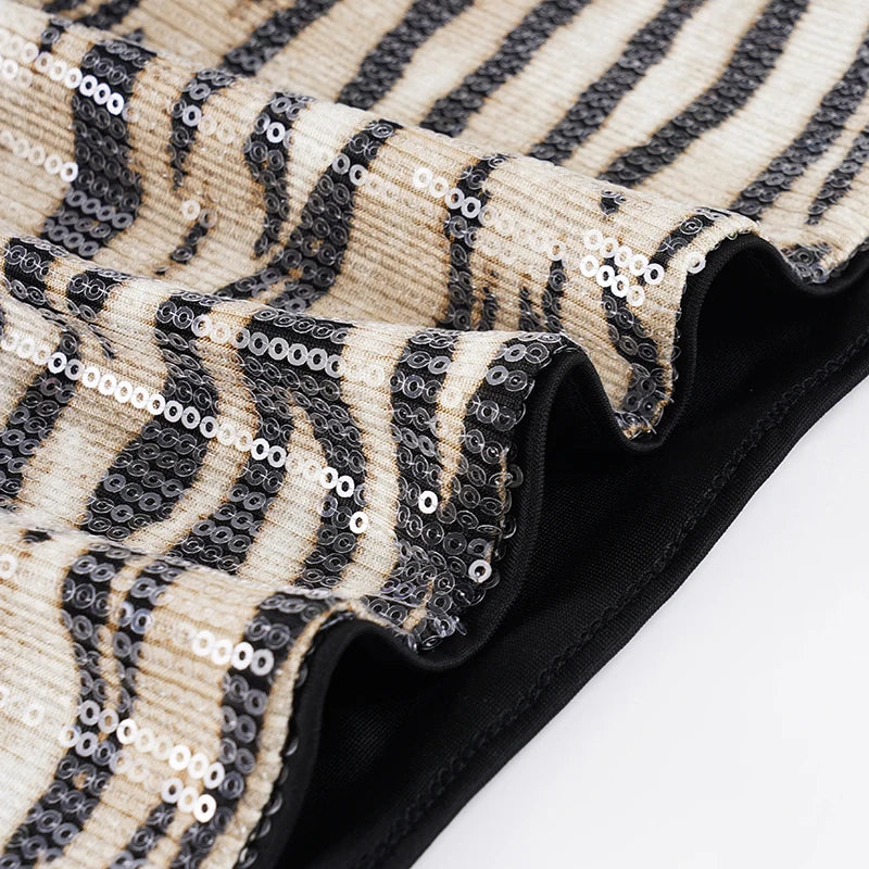 Sequin zebra print mini skirt on model - detail shot