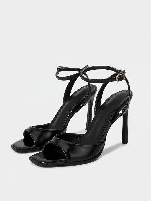 Square toe ankle strap stiletto heels on model