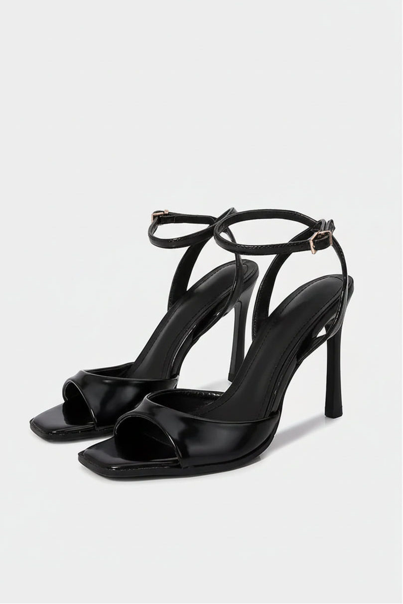 Square toe ankle strap stiletto heels on model
