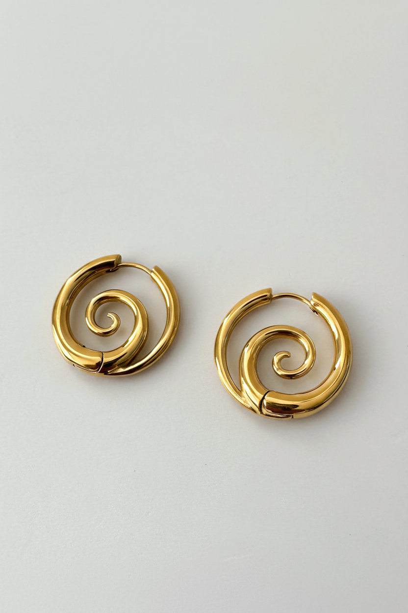 Spiral hoop earrings on model - detail shot