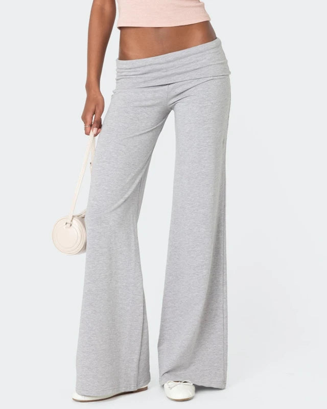 Fold over low rise wide leg pants on model - detail shot