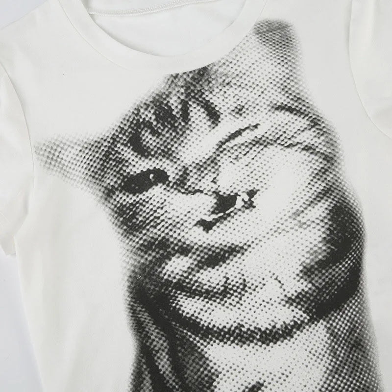Halftone cat graphic baby tee on model - styling view