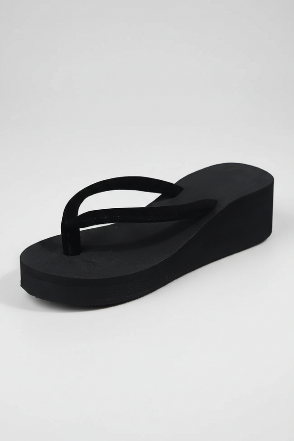 Foam platform flip flops on feet