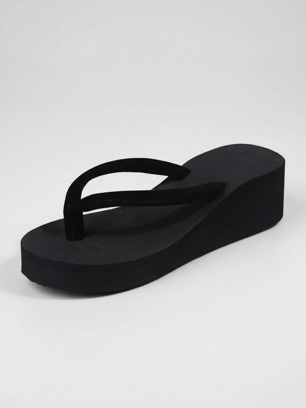 Foam platform flip flops on feet