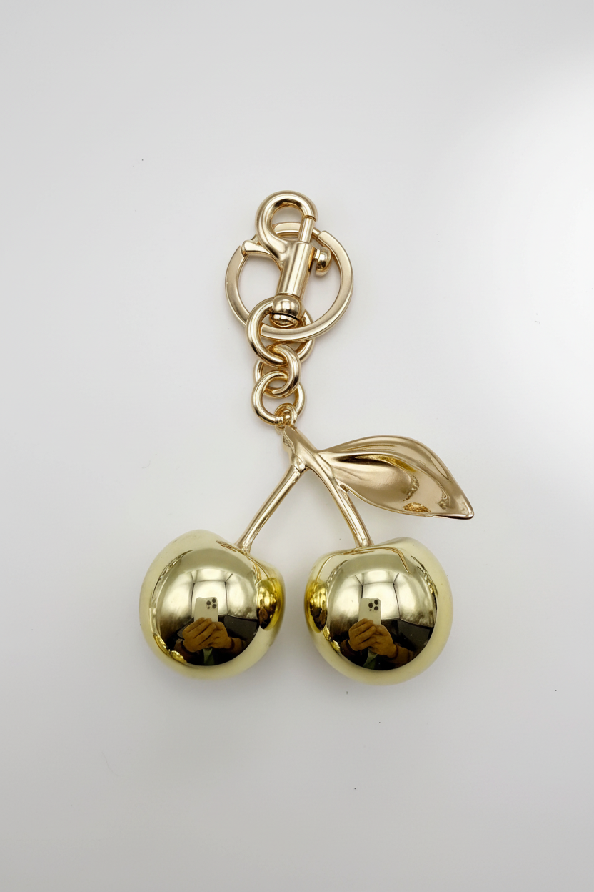 Mirror cherry bag charm on bag - alternate view