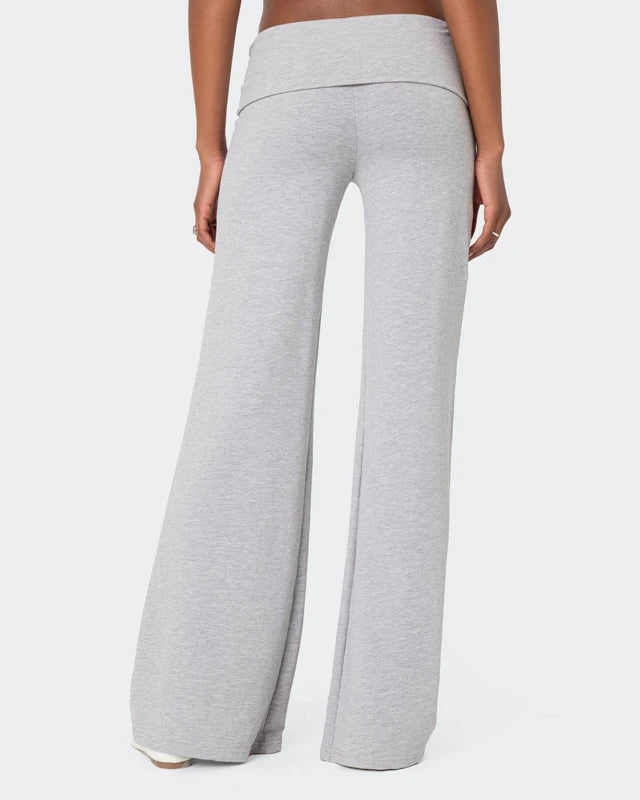 Fold over low rise wide leg pants on model - styling view