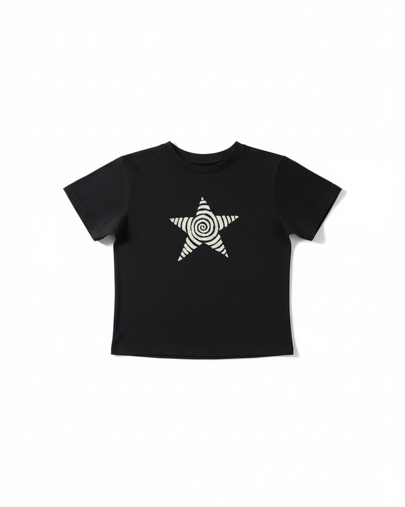 Spiral star graphic baby tee on model - alternate view