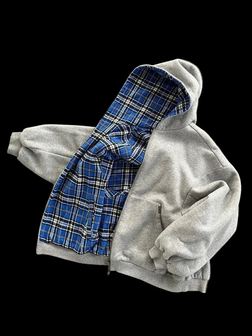 Reversible plaid zip hoodie on model - styling view
