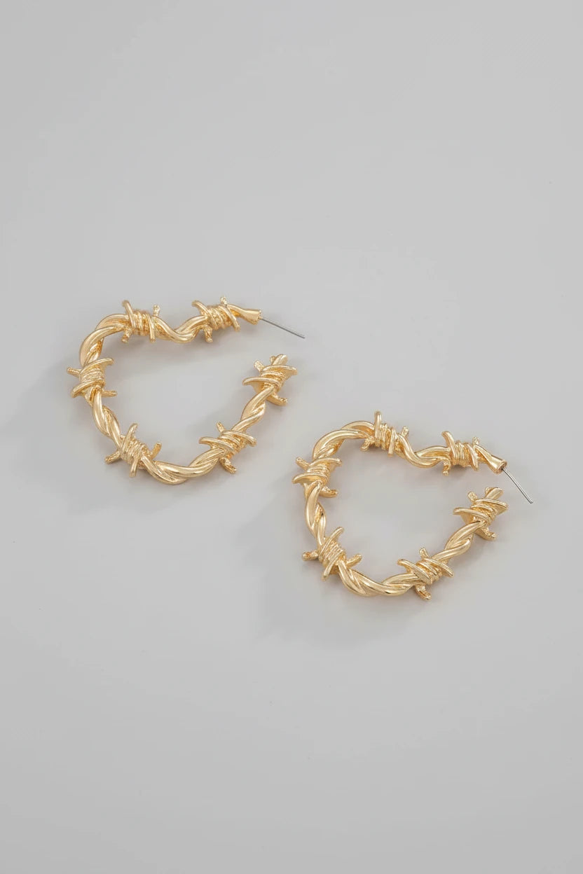 Barbed wire heart hoop earrings close up - alternate view