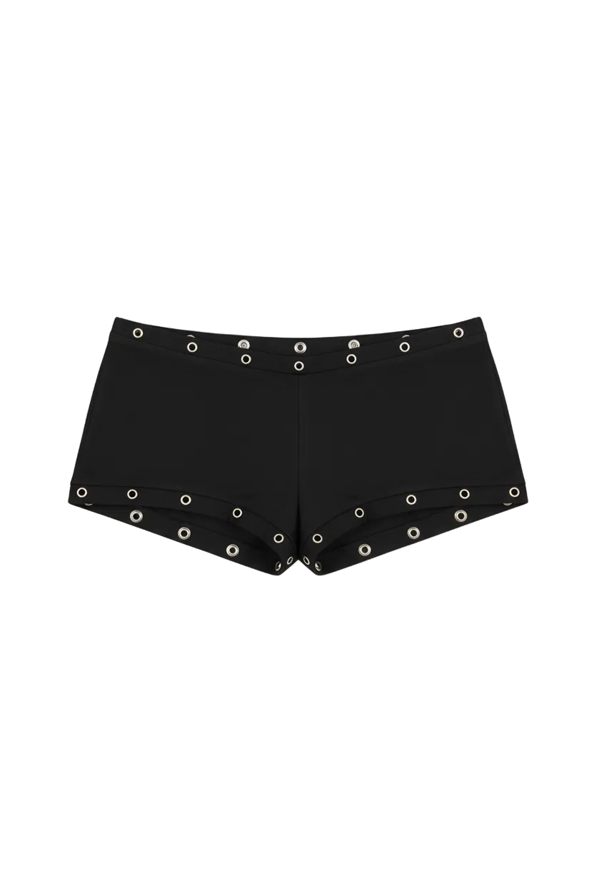 Grommet detail micro shorts on model - detail shot