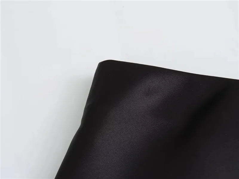 Black satin midi skirt on model - view 5