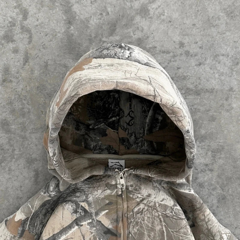 Boxy camouflage zip hoodie on model - detail shot