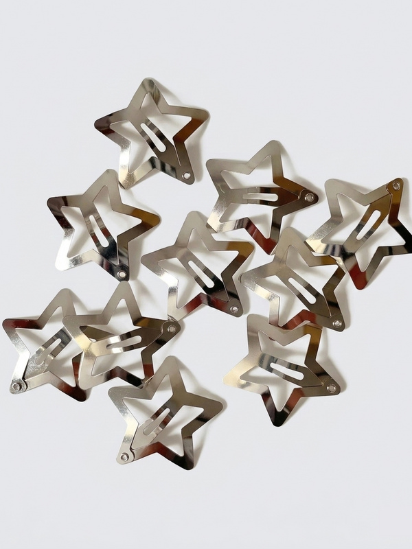 Silver star hair clips in hair