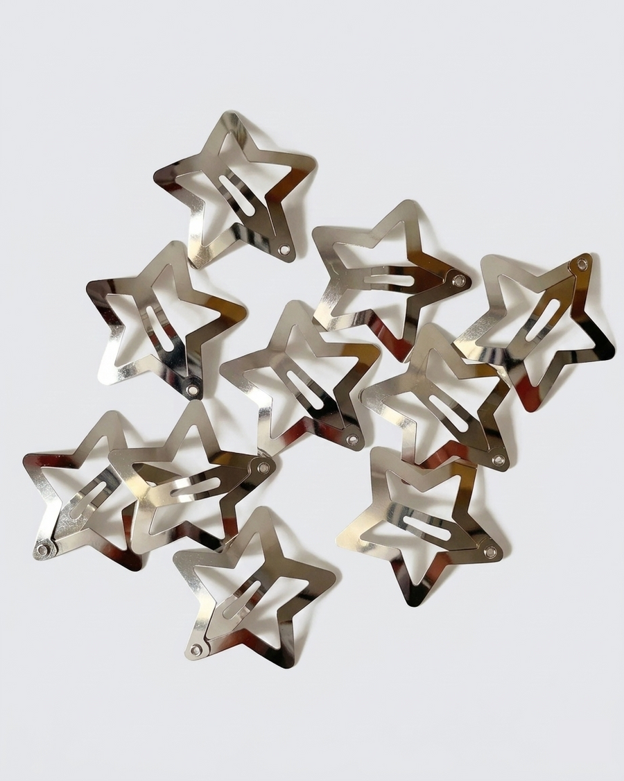 Silver star hair clips in hair