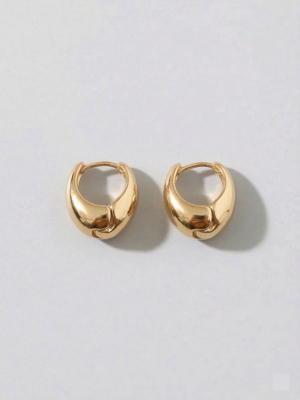 Chunky dome hoop earrings on model
