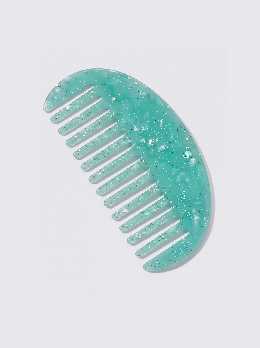 Half moon acetate hair comb on surface - view 8