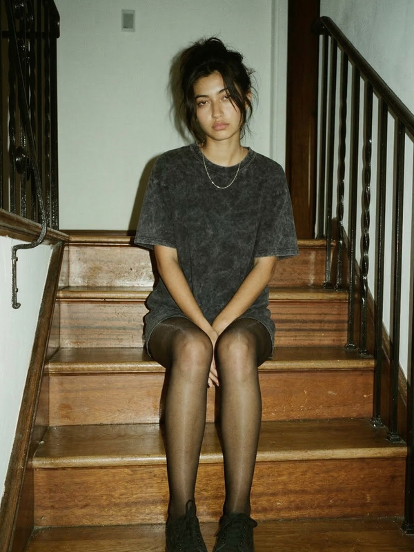 Oversized acid wash graphic t-shirt on model
