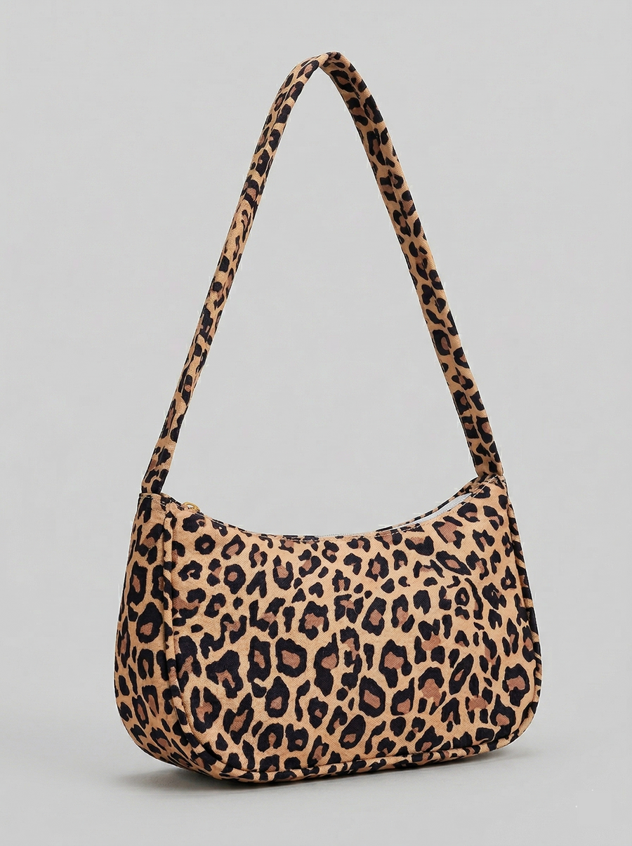 Animal print nylon shoulder bag flat lay - styling view